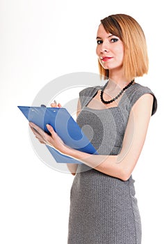 Young business woman standing with her clipboard isolated