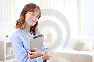 Young business woman with a tablet
