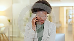 Young business woman talking on a phone call in an office. Confident entrepreneur smiling while communicating in a