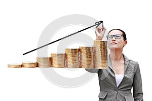Young Business woman using pen writing straight arrow on stack of gold coins and on air isolated on white background