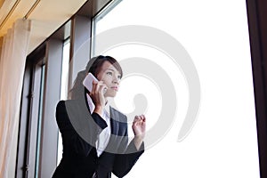 Young business woman using smart phone