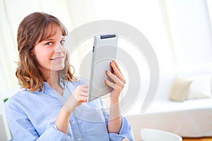 Young business woman using a tablet