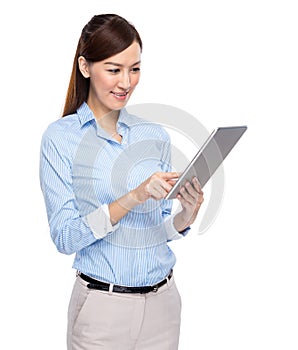 Young business woman using tablet
