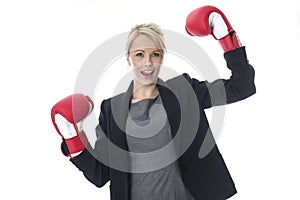 Young Business Woman Wearing Boxing Gloves