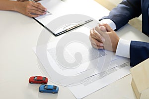 young business woman work paper for house car rent
