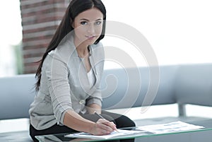 Business woman working with documents in the office