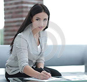 Business woman working with documents in the office