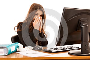 Young business woman working ill in office suffering - ilness a photo