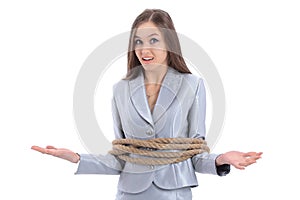 Young business woman wrapped a rope.