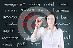 Young business woman writing cash flow concept