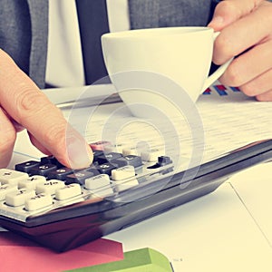 Young businessman checking accounts