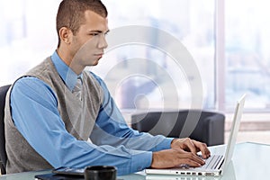 Young businessman concentrating