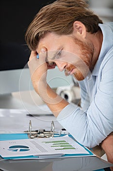 young businessman concrentating on graphics