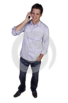 Young businessman conversing on cell phone