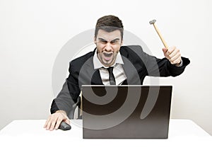 Young businessman Desk Rage