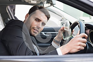 Young businessman driving while drunk