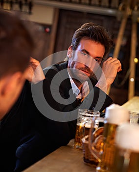 Young businessman drunk in pub