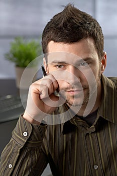 Young businessman focusing