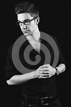 Young businessman in glasses black&white