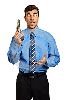 Young businessman with gun