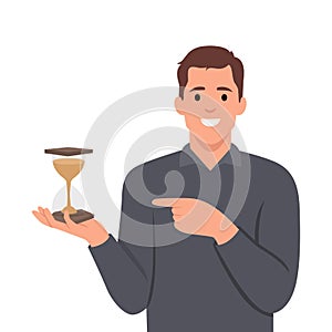 Young businessman hand holding antique hourglass. Time management vector business concept with sand clock