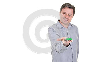 Young businessman hand over keys with copy space white background