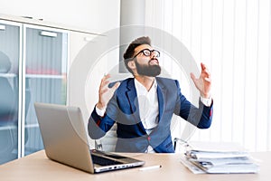 Young Businessman Has Very Stressful Day At Work