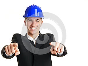 Young businessman in a helmet