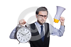The young businessman holding alarm clock isolated