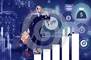 Young businessman jumping over steps of chart or graph