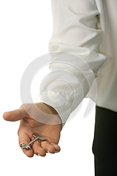 The young businessman with a key in a hand