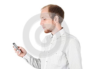 Young businessman with mobile phone isolated