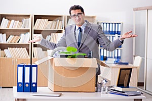 The young businessman moving offices after being made redundant