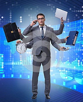 Young businessman in multitasking concept