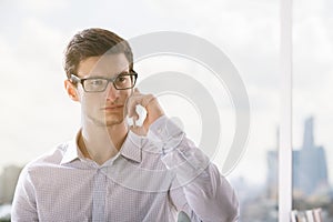 Young businessman on phone