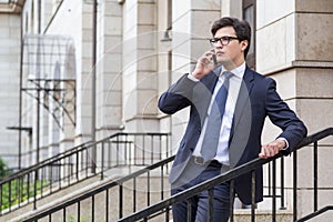 Young businessman on phone