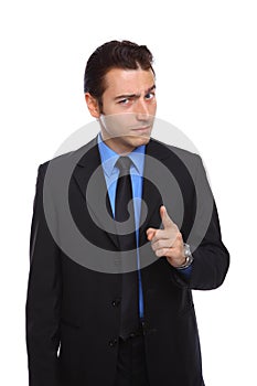 Young businessman pointing with attitude