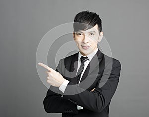 Business man pointing copy space