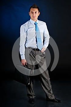 Young businessman with a portfolio