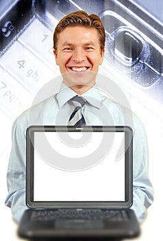 Young businessman presenting a laptop