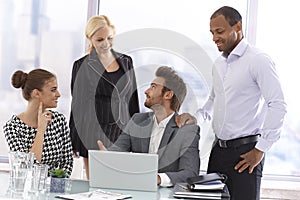 Young businessman presenting at a meeting