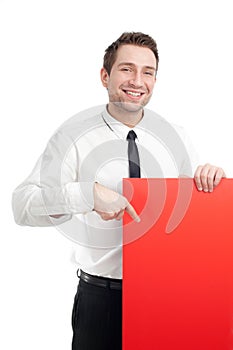 Young Businessman with red blank sign smiling