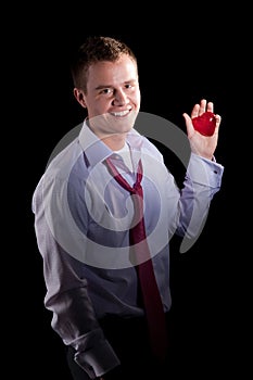 Young businessman with red heart