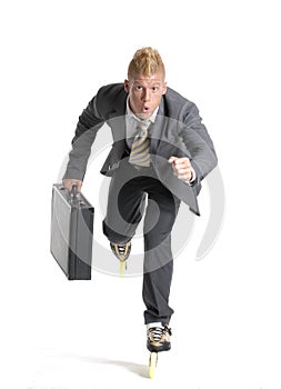Young businessman on rollerblade photo