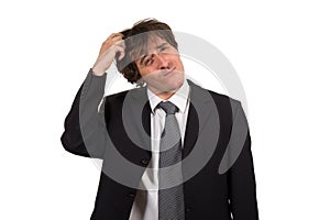 Young businessman scratching his head, hard decision, studio shoot isolated on white background