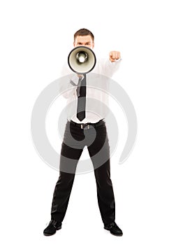 Young businessman screaming with a megaphone