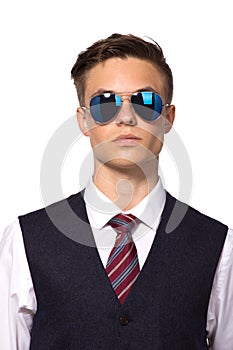 Young businessman in shirt and tie wear sunglasses isolated on white