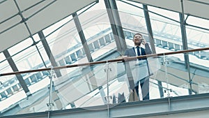 Young businessman with shopping bag