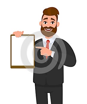 Young businessman showing blank clipboard and pointing index finger. Person holding notepad. Male character design illustration.