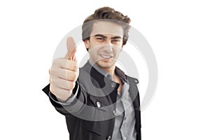 Young businessman showing OK sign with his thumb up